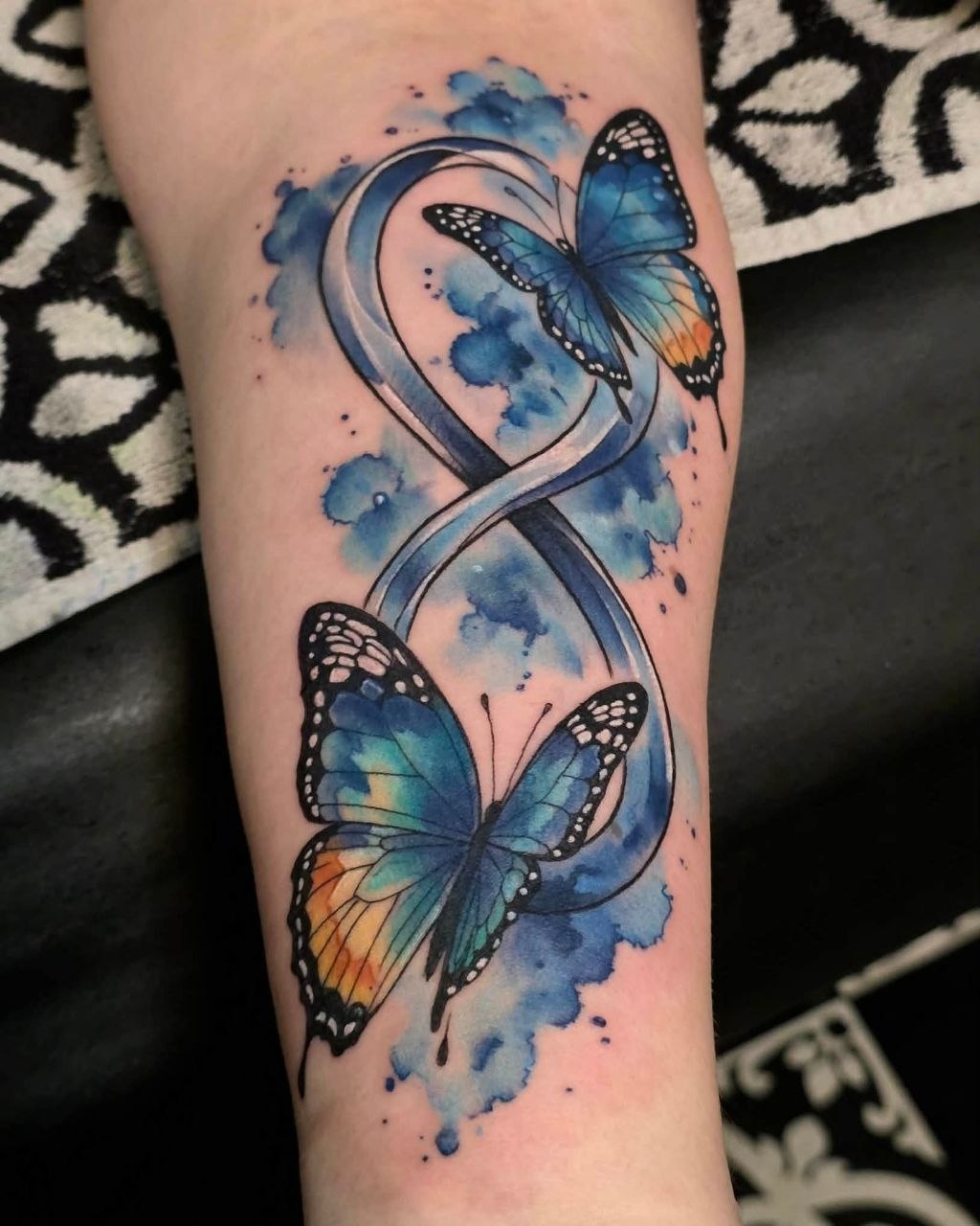 Blue watercolour butterflies with infinity symbol